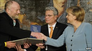Merkel honours Danish Muhammad cartoonist Westergaard