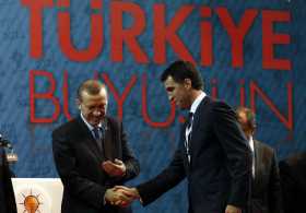 91851 turkeys pm erdogan shakes hands with istanbul candidate hakan sukur du