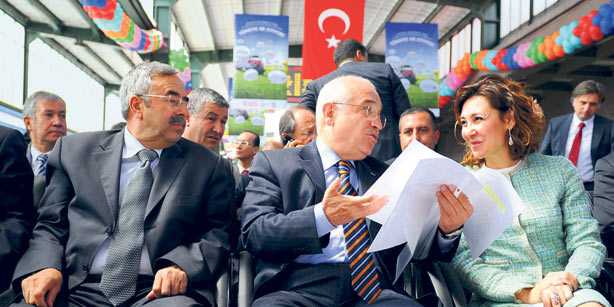 Mehmet Habib Soluk (R) attended a program on a train with State Minister Cemiş Çiçek (C) in Ankara.