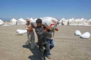 Turkey building giant tent city as Syrian refugees swell
