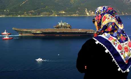The rusty-looking Varyag aircraft carrier sold by the Ukraine to China passes through the Bosphorus near Istanbul in 2001 en route to Dalian where it has been refurbished to join the Chinese naval fleet. China initially claimed it was going to be a floating casino. Photograph: Kerim Okten/EPA