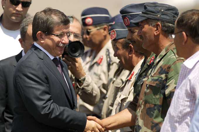 In Benghazi on Sunday, Turkish Foreign Minister Ahmet Davutoglu offered the rebels official recognition [AFP]