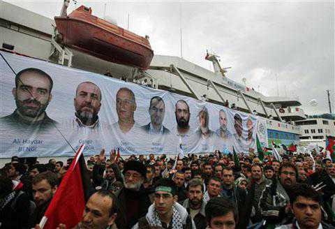 A banner depicting the faces of the nine men killed, displayed on the Mavi Marmara ship, the lead boat of a flotilla headed to the Gaza Strip which was stormed by Israeli naval commandos in a predawn confrontation in the Mediterranean May 31, 2010, on its returns, in Istanbul, Turkey, 26 Dec 2010