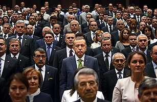 The standout Erdogan with his party's newly elected MPs after June's landslide  Photograph by Adem Altan