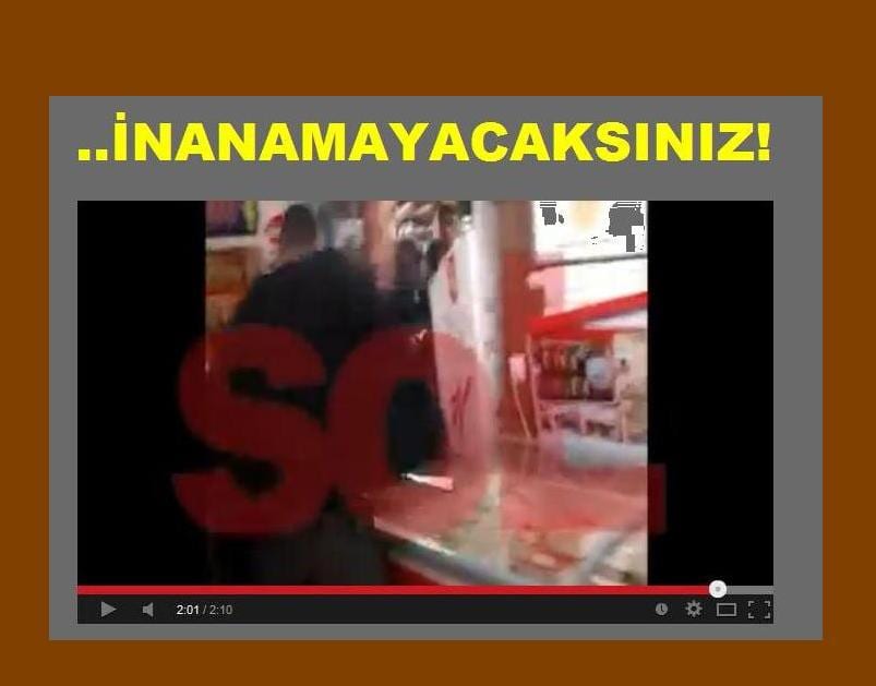 Başbakan Erdoğan'ın Soma'da yoğun protestoların ardından bir markete sığınması ve markette kendisine tepki gösteren birisine saldırmasıyla ilgili yeni görüntüler ortaya çıktı. - 15may141 11